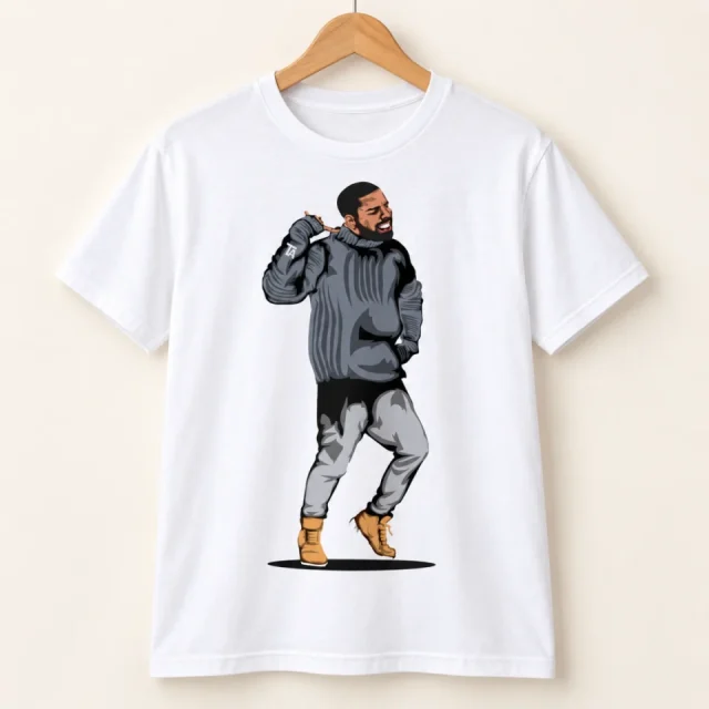 Studio view of a T-shirt with full-length illustrated figure in a dark hoodie and tan boots