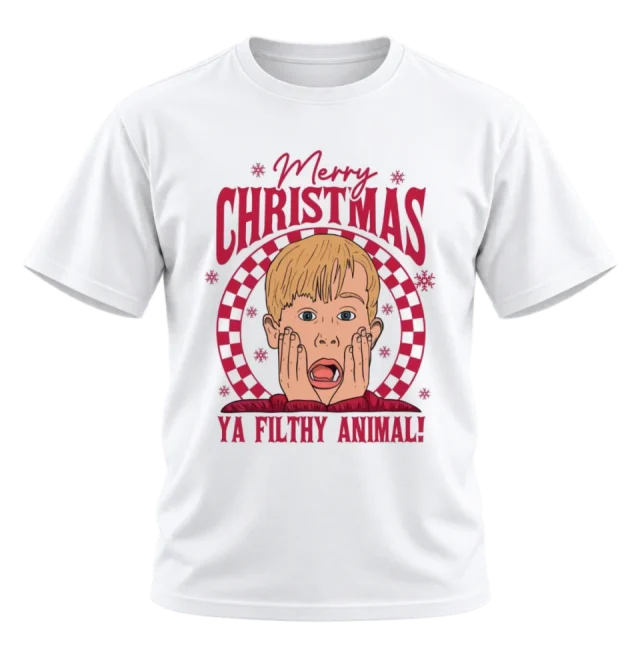 White Christmas T-shirt with a red Merry Christmas and Ya Filthy Animal design, illustrated surprised boy, snowflakes and checkerboard circle.
